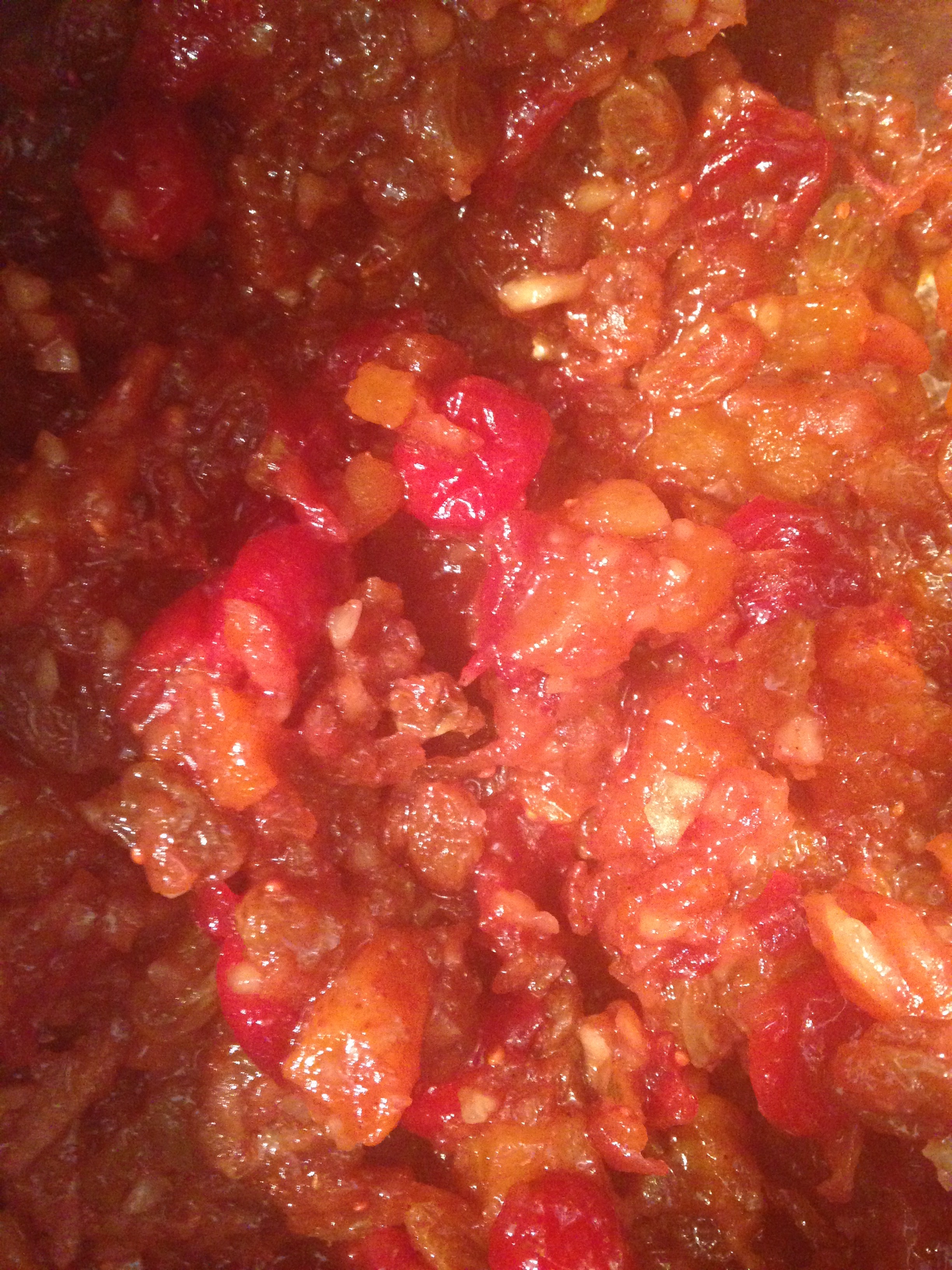 Reduce the heat to a low setting and simmer for around 5 minutes or until the cranberries have softened and have started to burst open